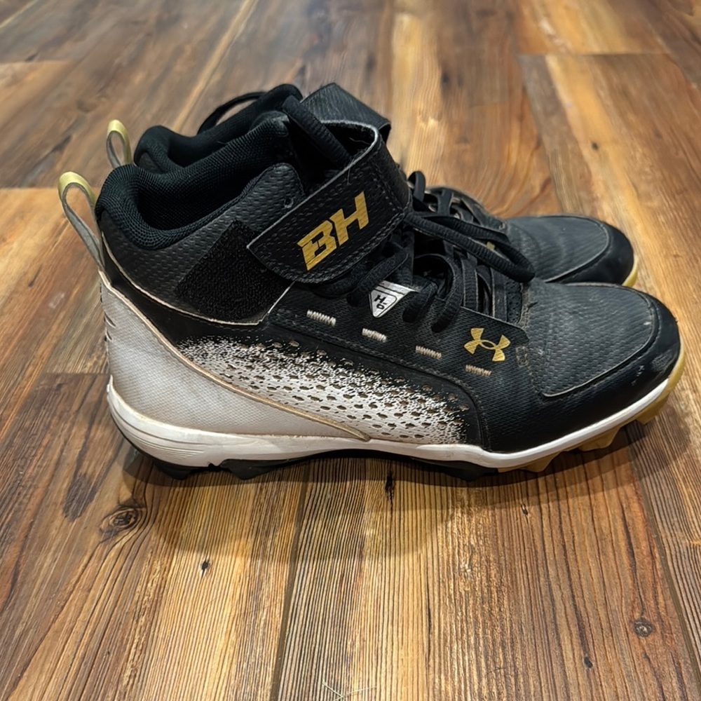 Under Armour Kids Black and Gold cleats